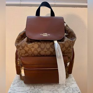Authentic Signature Coach baby bag